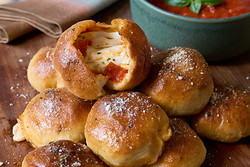 Pizza Bombs with Marinated Fresh Mozzarella Basil & Garlic