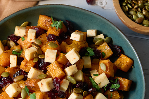 Roasted Squash with Cranberries, Fresh Asiago with Calabrian Chili Peppers & Pumpkin Seeds